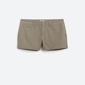 Never been worn mid rise shorts. Color Olive.